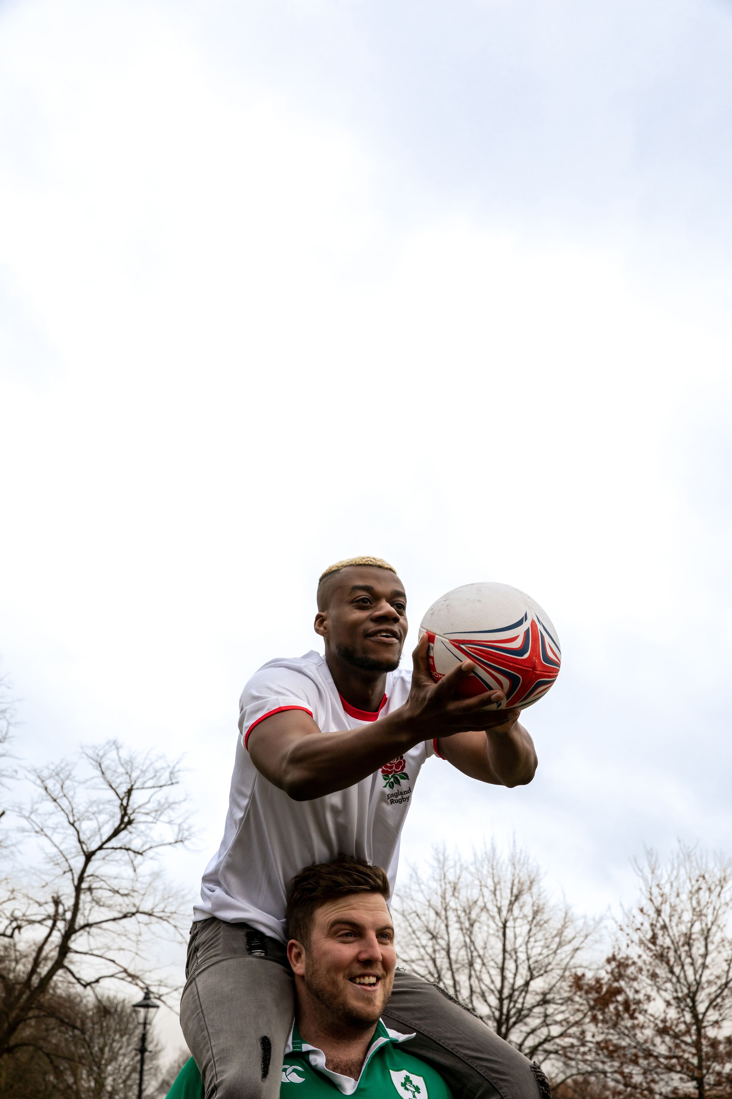 Rugby player enjoying a game at Clapham North Pub